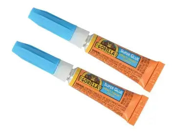 Gorilla Superglue 3g package featuring two tubes with blue caps for quick and strong bonding of various materials.